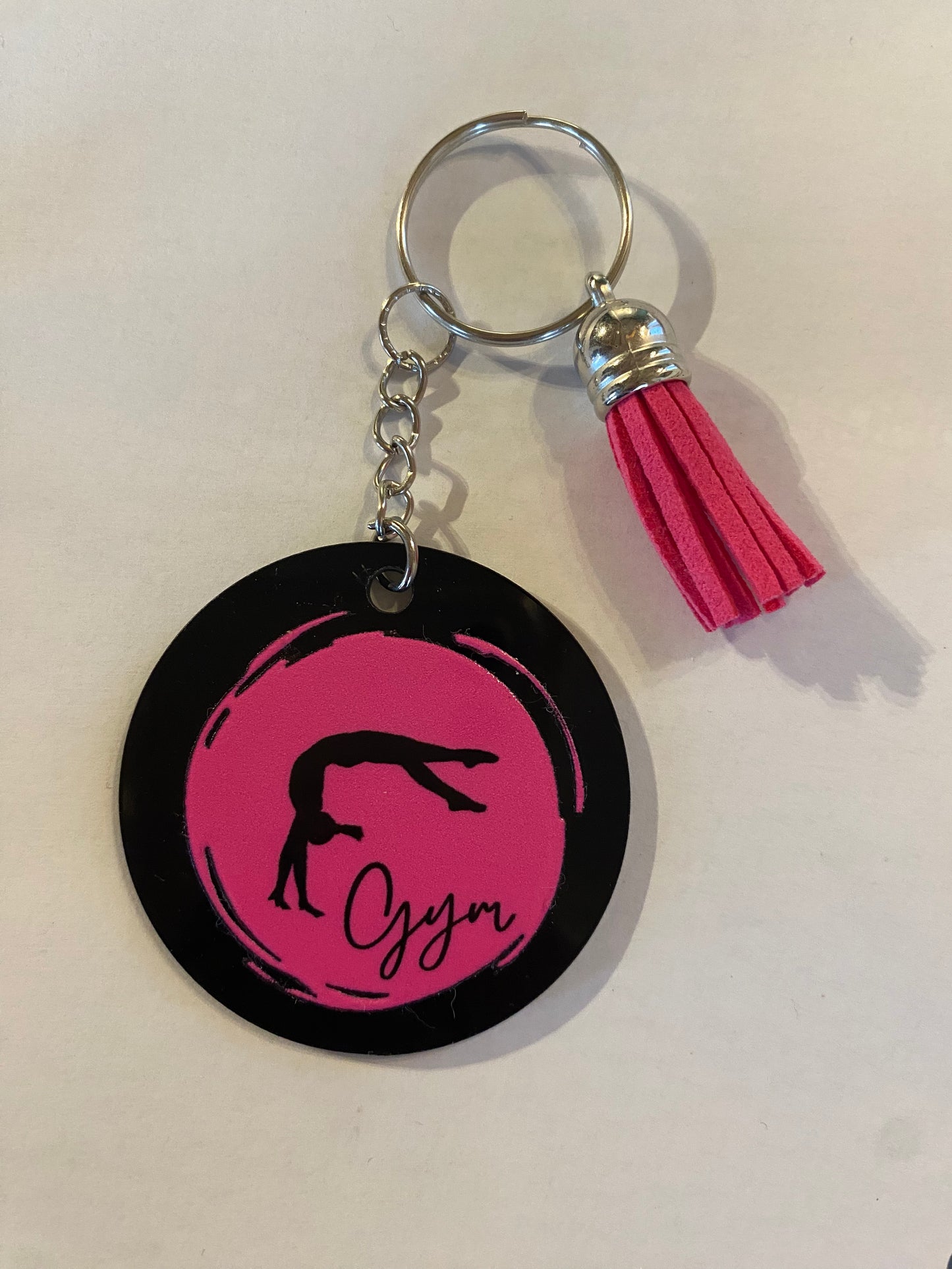 Porte clé / Déco de sac GYM rond noir modèle rond pastel